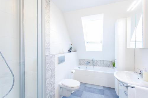 Ένα μπάνιο στο Ferienwohnung Mittendrin