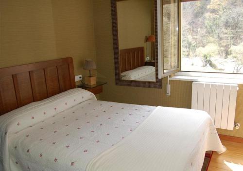 Katil atau katil-katil dalam bilik di Hotel del Alto Sella