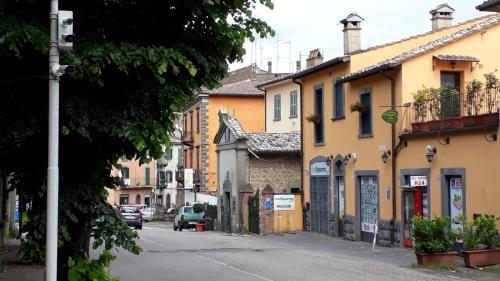 a street in a small town with buildings at "Profumo di Tiglio" in Bagnoregio