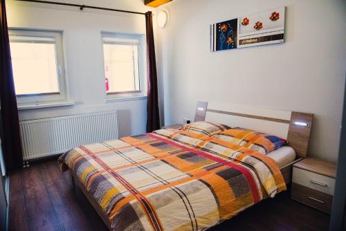 Llit o llits en una habitació de Apartment Tara