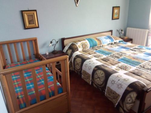 Ένα ή περισσότερα κρεβάτια σε δωμάτιο στο Condominio Ariazzurra S. Bart.