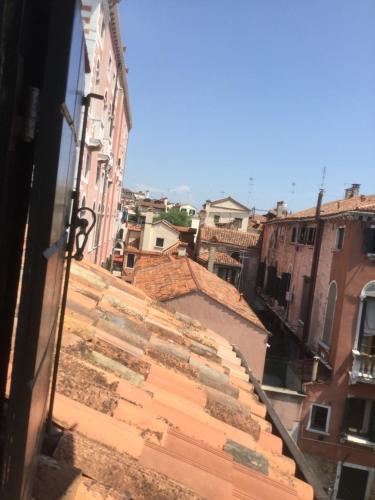 a view of an alley from a building at Penthouse Of Venice in Venice