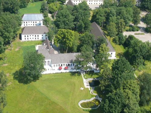 an aerial view of a large white house at B&O Parkhotel in Bad Aibling