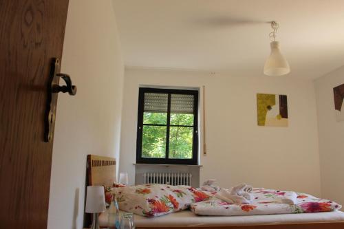 Postel nebo postele na pokoji v ubytování Gasthof Gruner Baum
