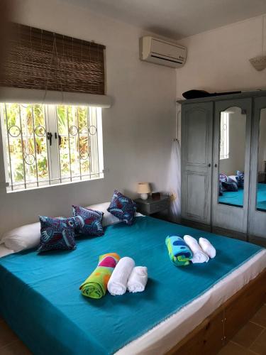 Villa Sirandaneにあるベッド