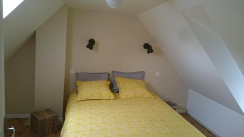 Llit o llits en una habitació de Maison de village/Appartement de charme avec extérieur
