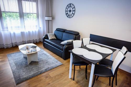 Svetainės erdvė apgyvendinimo įstaigoje Apartamenty Sun & Snow Zielona