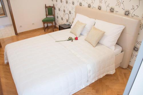 Postel nebo postele na pokoji v ubytování Apartment Mara