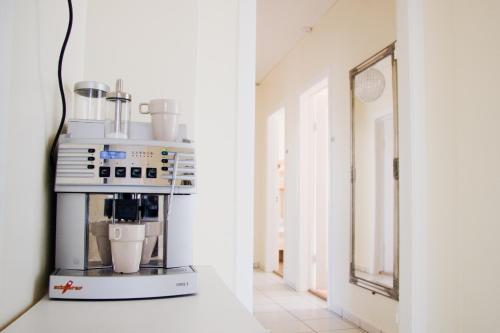 a coffee machine sitting on a counter in a room at Igdlo Guesthouse in Reykjavík