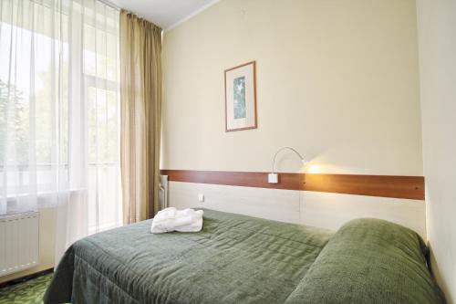 Katil atau katil-katil dalam bilik di Medical SPA "Eglės sanatorija" Standard Druskininkai