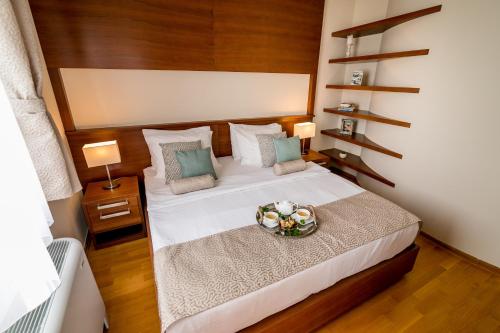 Hedera Residences - Kumborにあるベッド