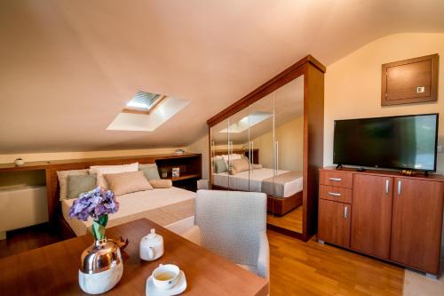 Hedera Residences - Kumborにあるベッド