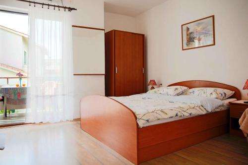 Postel nebo postele na pokoji v ubytování Apartments & Rooms Samohod