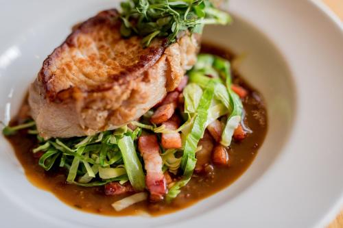 a plate of food with a bowl of soup at Failte Hotel in Killarney