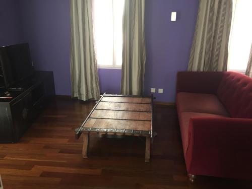 a living room with a couch and a coffee table at Le Suites al Lago in Melide