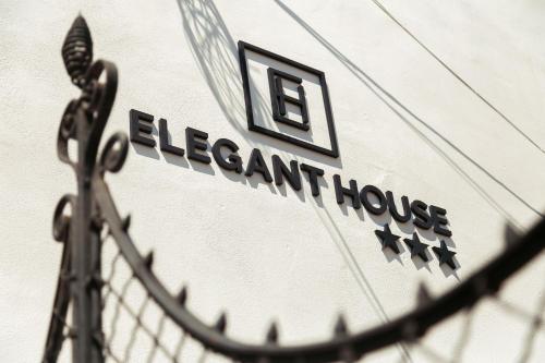 a sign on the side of a boat with the word elephant house at Elegant House in Făgăraş