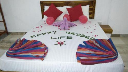 Katil atau katil-katil dalam bilik di Amaya River Side Homestay