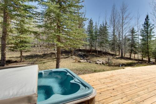 a jacuzzi tub sitting on a wooden deck at Desperado Dream in Hailey