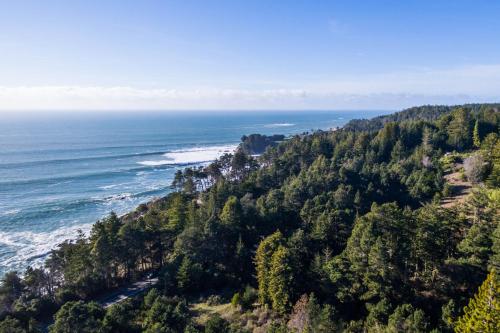 a view of the ocean from the top of a hill at Feelin' Beachy in Gualala