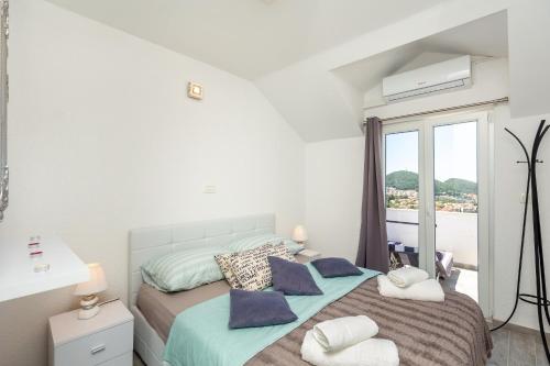 Postel nebo postele na pokoji v ubytování Apartment Horizon