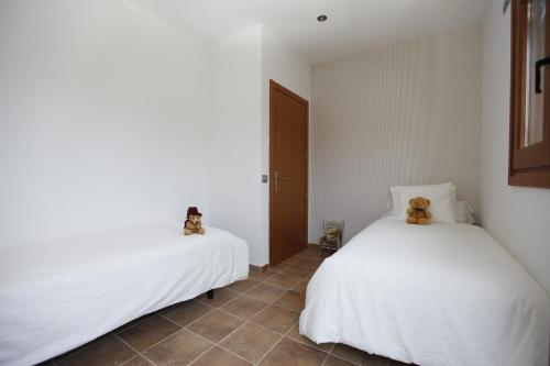 Una cama o camas en una habitación de Can Pletis