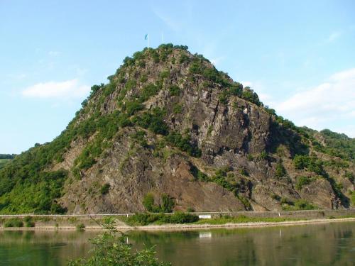 a mountain on the side of a river with a road at Hotel Ohm Patt in Boppard