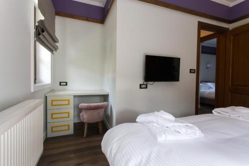 Letto o letti in una camera di Abi Luxury Villas