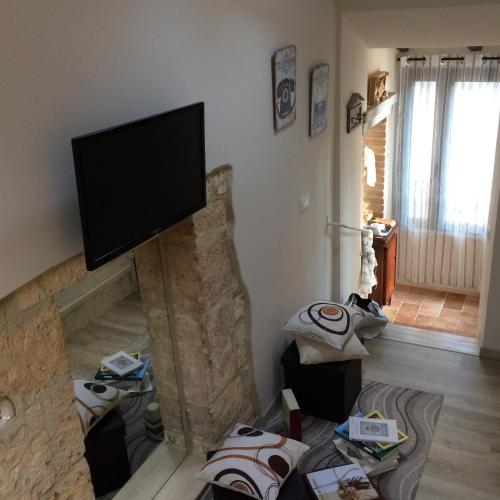 TV a/nebo společenská místnost v ubytování Casetta di San Martino