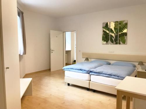 Postel nebo postele na pokoji v ubytování Manzoni Premium