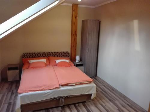 Postel nebo postele na pokoji v ubytování Rita Apartman