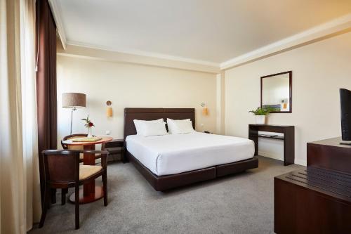 Katil atau katil-katil dalam bilik di Hotel As Americas