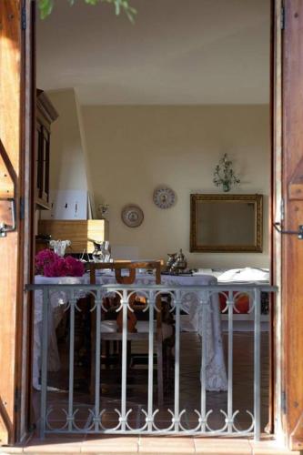a room with a table and a dining room at Villa Amalia Srls in Gizzeria