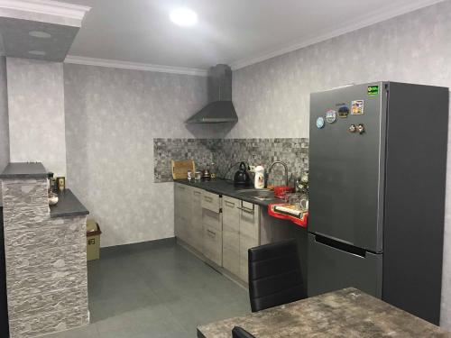 Kuchyň nebo kuchyňský kout v ubytování Guesthouse Ori Beli in Mestia