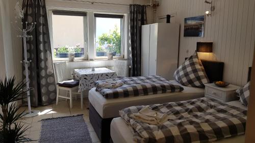 Ένα ή περισσότερα κρεβάτια σε δωμάτιο στο Zimmer am Schwielowsee