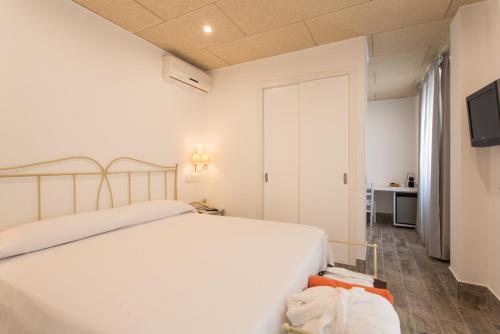 Postel nebo postele na pokoji v ubytování Hotel & Spa Entre Pinos-Adults Only