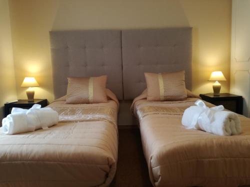 Ένα ή περισσότερα κρεβάτια σε δωμάτιο στο Sensations Guesthouse