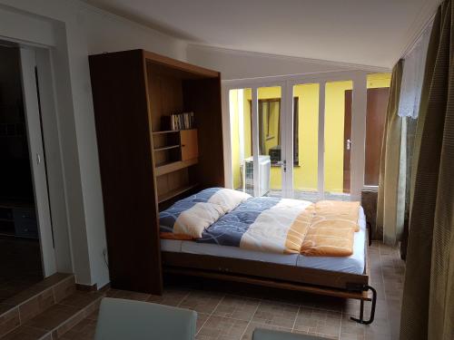 En eller flere senger på et rom på Ferienhaus Sonnenweg