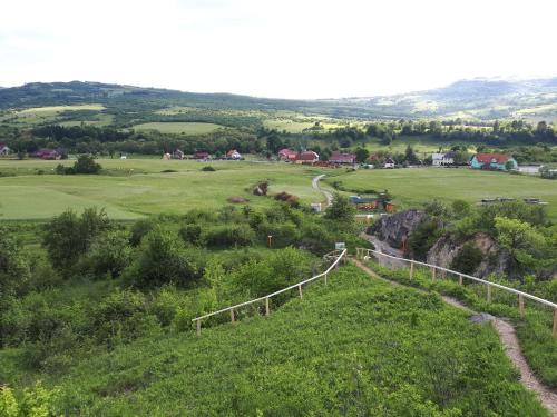 a view of the countryside from a hill at Lörincz Vendégház in Corund