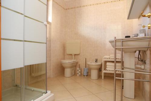 Koupelna v ubytování Casa "Giardino sulla Baia"