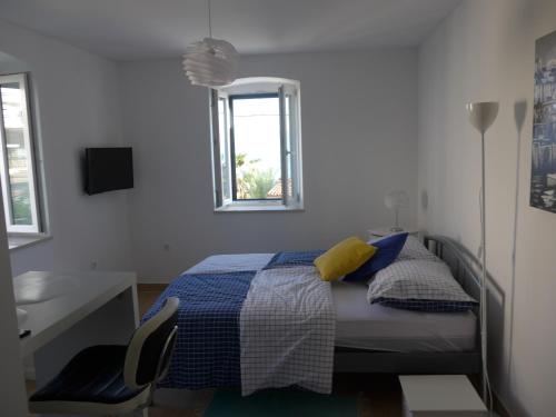 Ένα ή περισσότερα κρεβάτια σε δωμάτιο στο Villa Adria