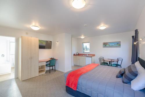 En eller flere senger på et rom på Bella Vista Motel Te Anau
