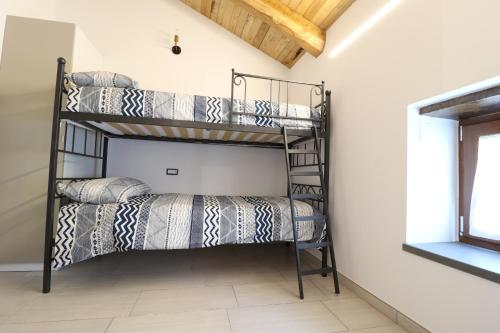 Letto o letti in una camera di Borgo Cilento Residence