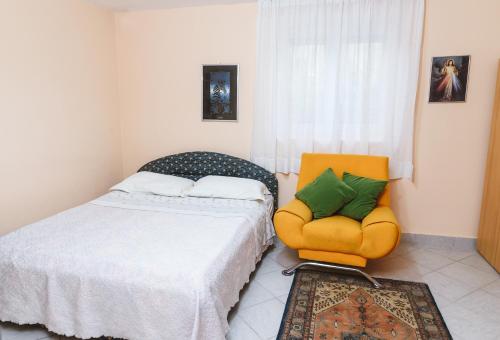 En eller flere senge i et værelse på Apartment Pina
