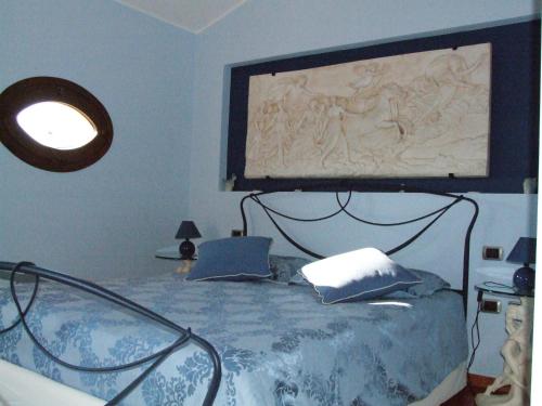 Ένα ή περισσότερα κρεβάτια σε δωμάτιο στο Keira B&B