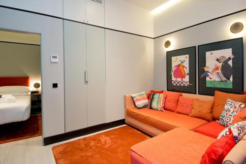 Łóżko lub łóżka w pokoju w obiekcie Amor de Dios 17 Boutique Apartments