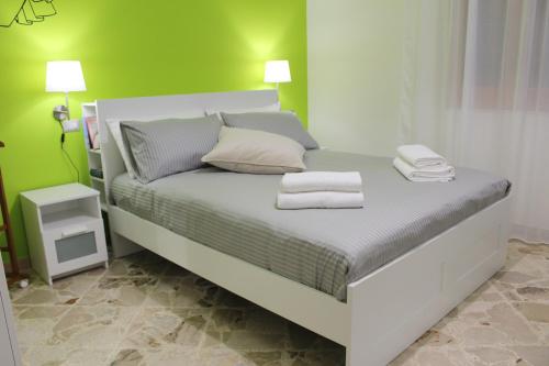 Postel nebo postele na pokoji v ubytování La Chiave Rossa B&B