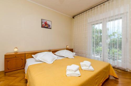 Postel nebo postele na pokoji v ubytování Apartment Antonija
