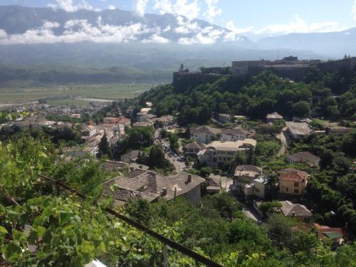 a city viewed from the top of a hill at Guest House Salaria in Gjirokastër