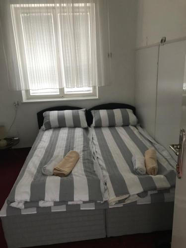 Cama o camas de una habitación en Sarajevo Rooms