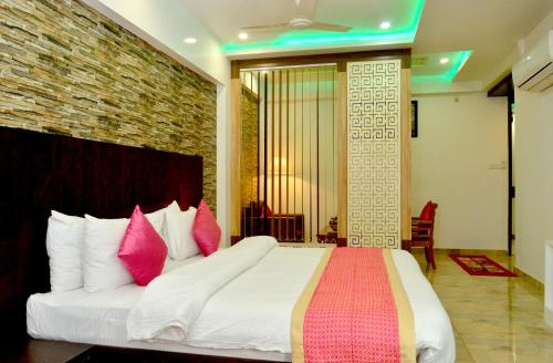 Katil atau katil-katil dalam bilik di Hotel SGT Plaza